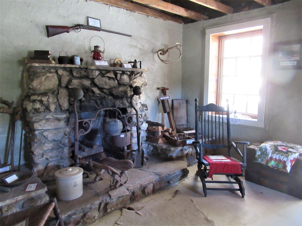 This is a photo of the hearth and the furnishings in the old Adobe.